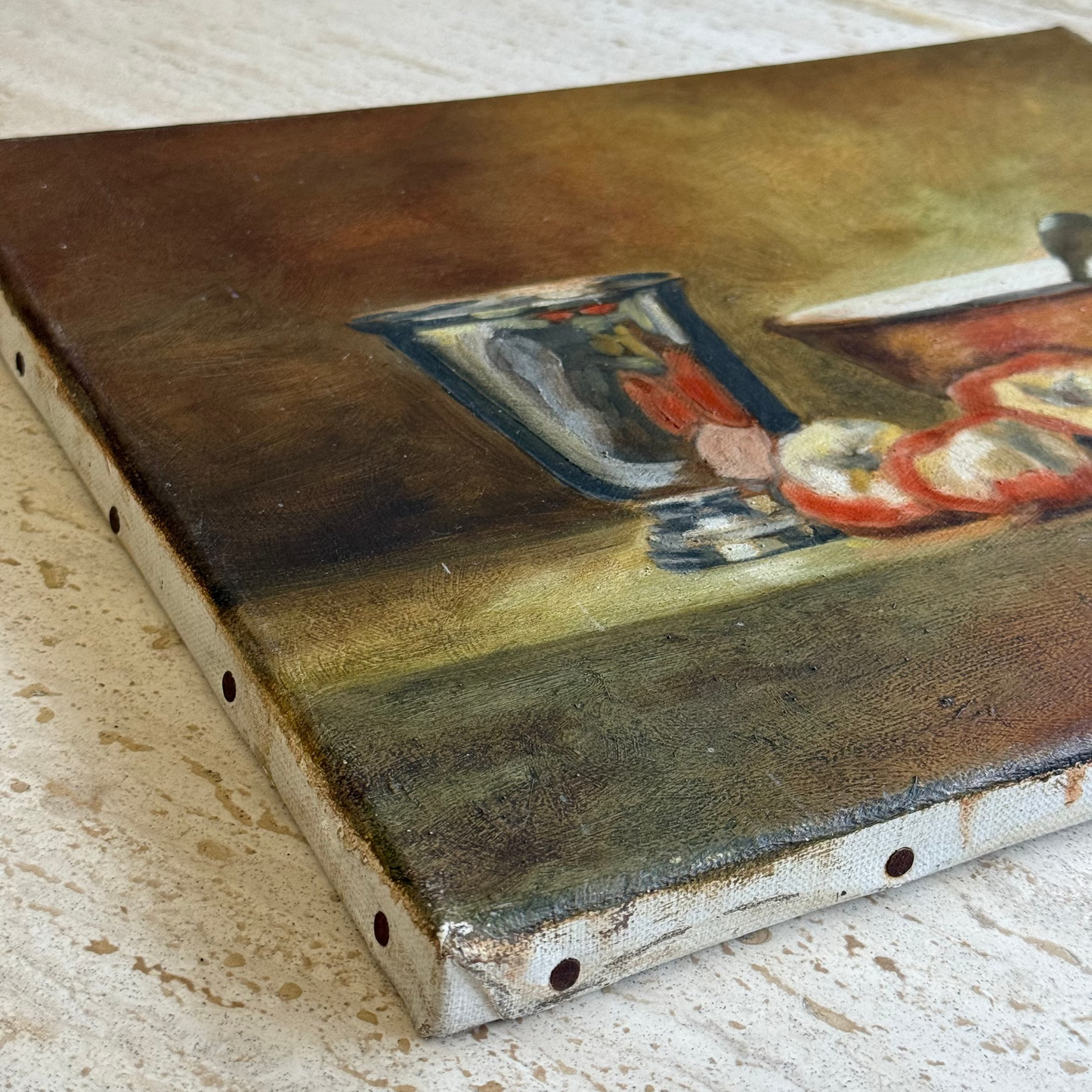 Close-up of a vintage painting on a textured surface