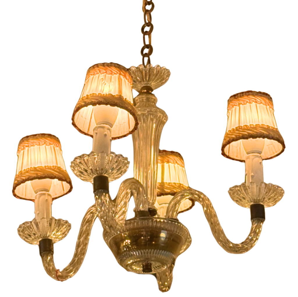 A vintage-style five-light chandelier with clear ribbed glass arms and matching shades, accented by warm gold-toned metal details and a hanging chain, isolated on a white background.