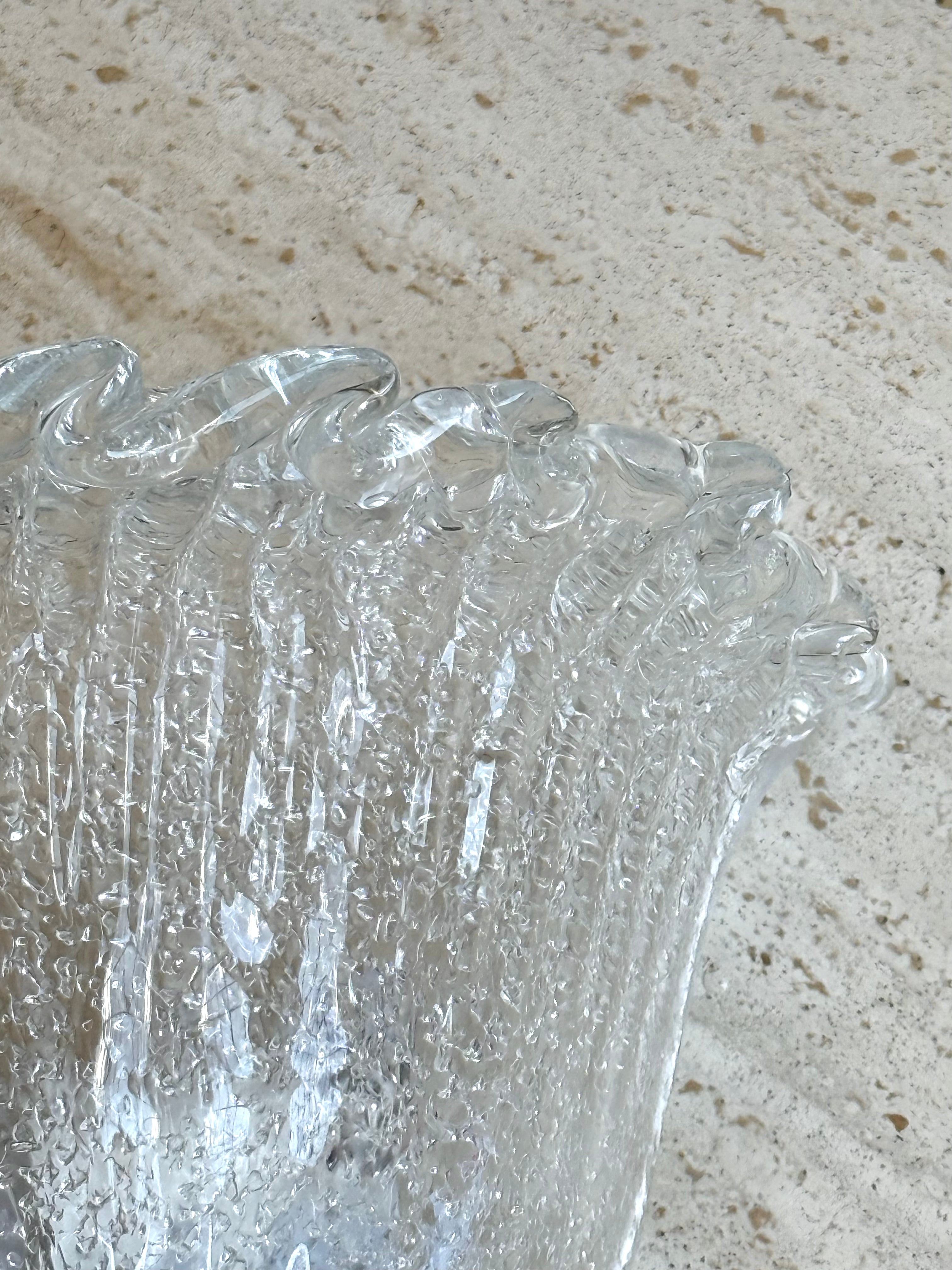 Murano Graniglia Sconce frill trim detail on a stone table 