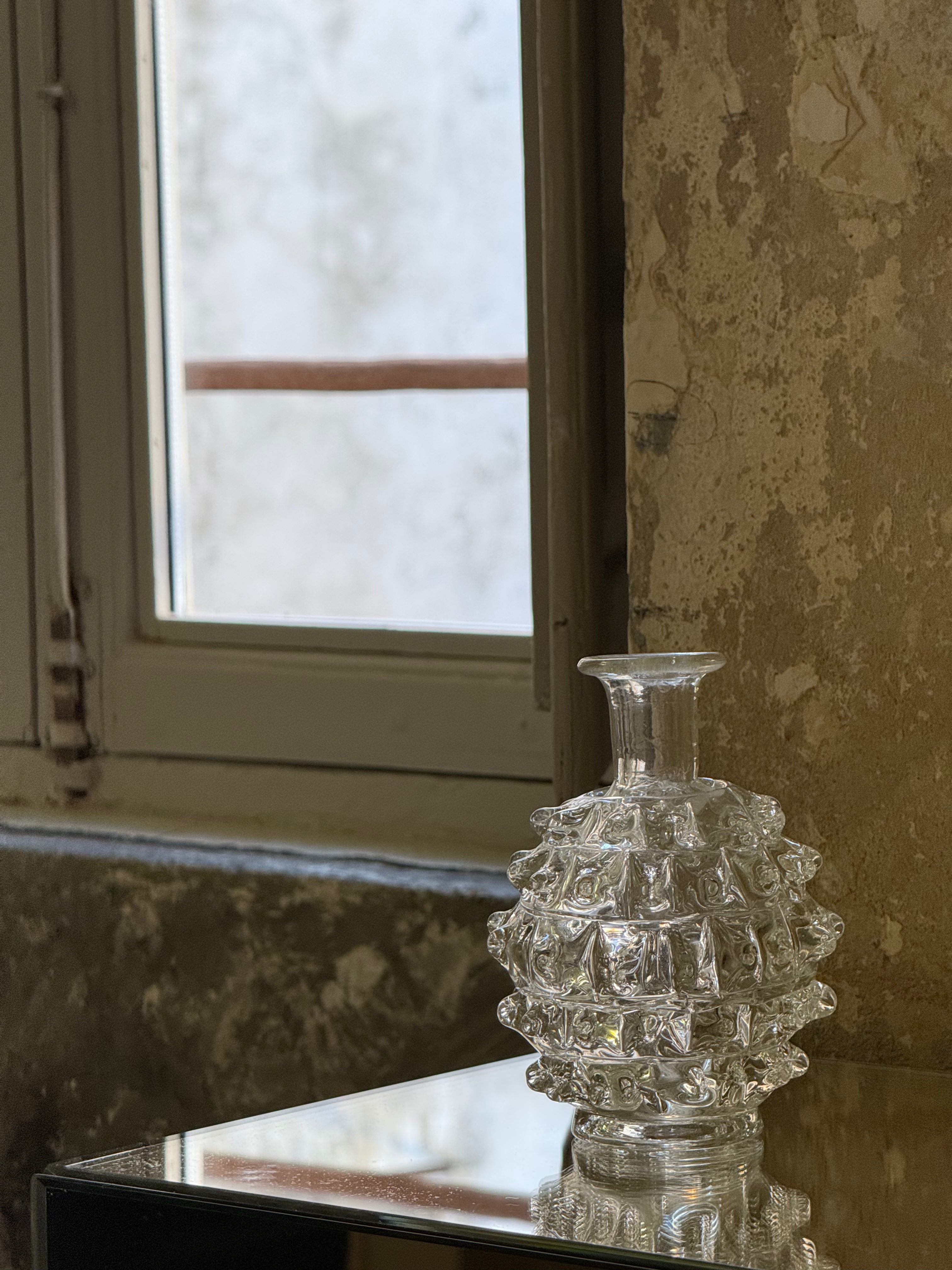 murano rostrato vase on mirror ledge