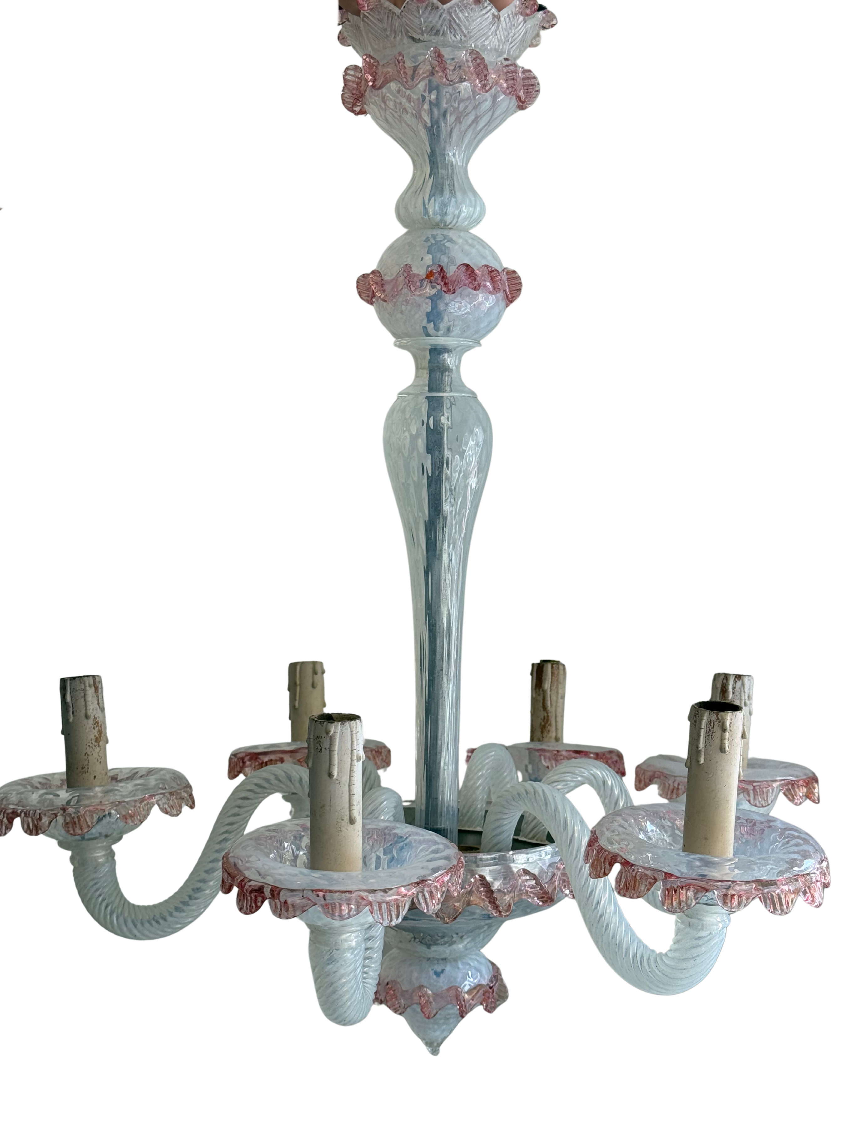 A six-light Venetian-style glass chandelier with a pale blue-green glass body and pink ruffled accents, shown against a plain white background.