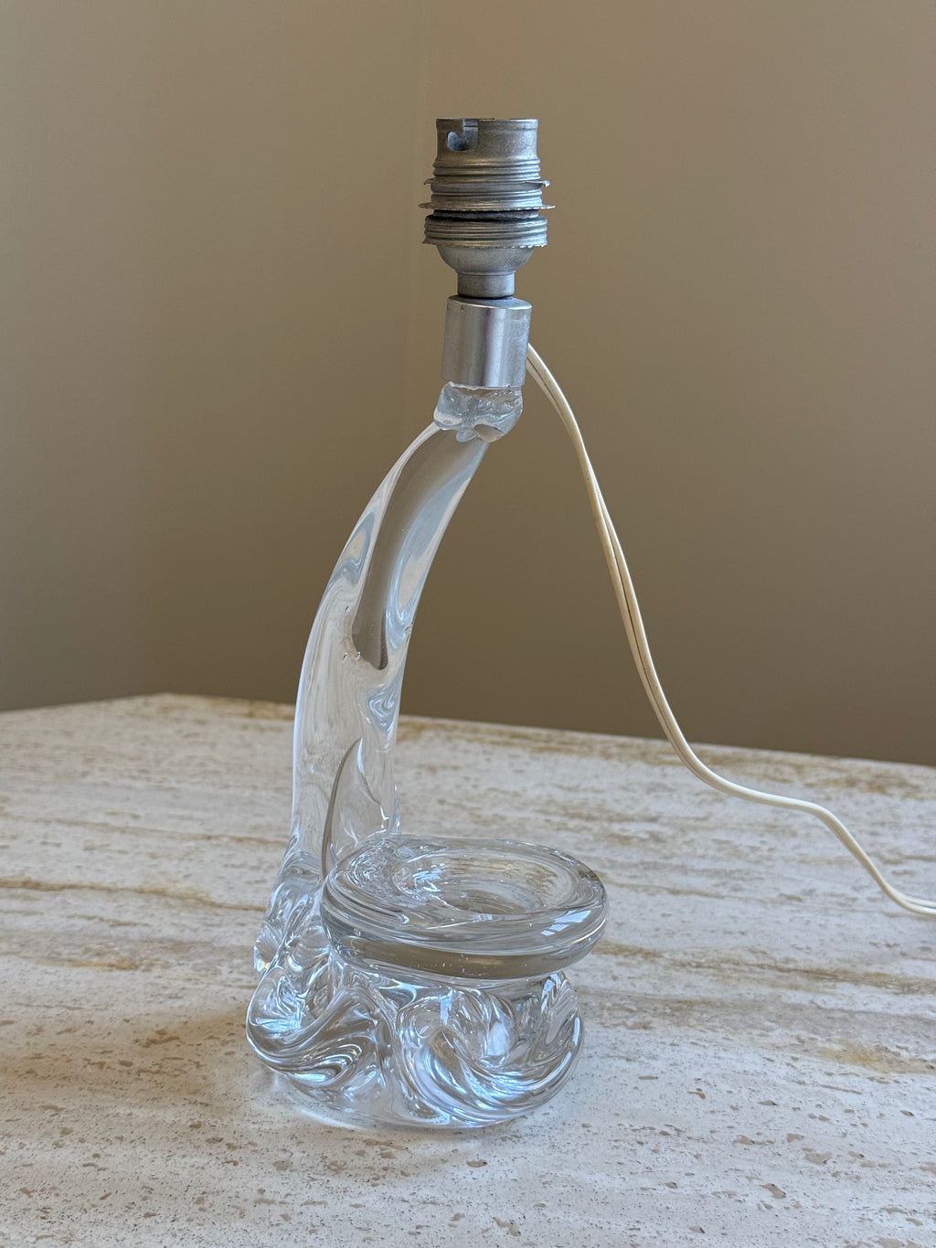 Crystal lamp base on travertine table 