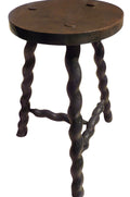 A rustic dark brown wooden stool with a round seat and twisted spiral legs, isolated on a white background.