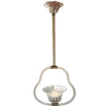 A vintage-style pendant light fixture featuring a textured brass stem, a fluted clear glass shade at the top, and a clear glass loop base holding a small lit candle holder.