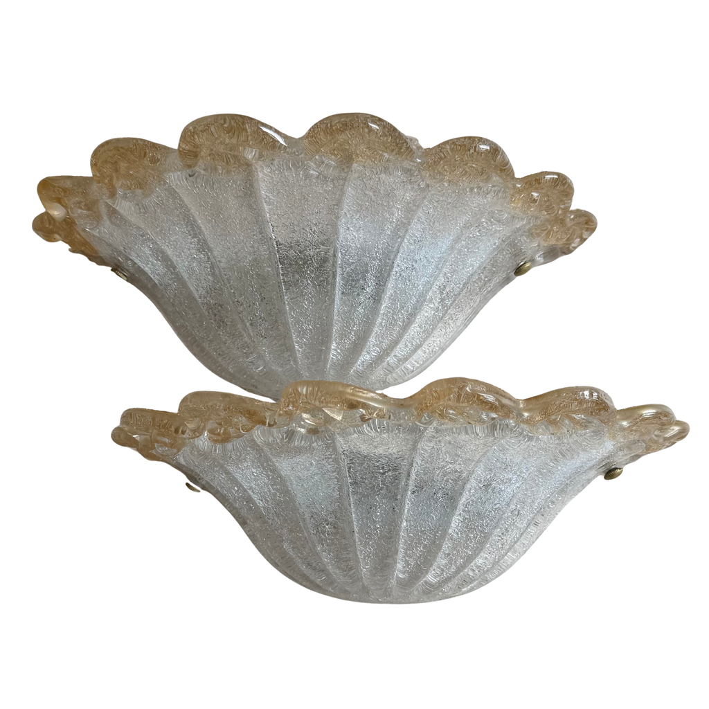Two vintage Venetian Murano glass sconces with a textured, ribbed shell-like design and a warm amber-brown tint along the scalloped edges, shown against a plain white background.