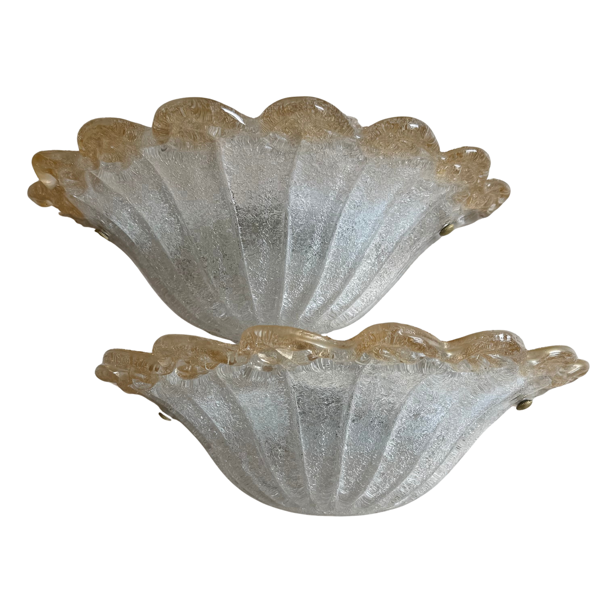 Two vintage Venetian Murano glass sconces with a textured, ribbed shell-like design and a warm amber-brown tint along the scalloped edges, shown against a plain white background.